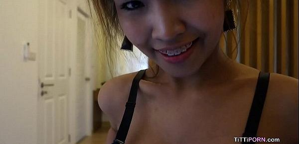  Hot Asian babe with massive natural tits